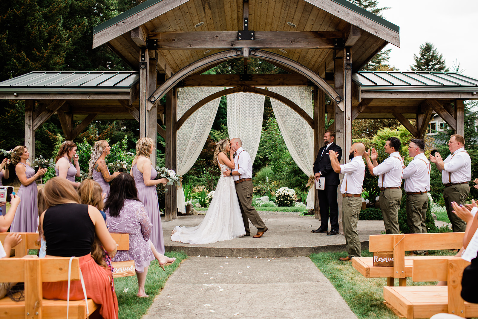 Husband Wife first kiss at Rein Fire Ranch wedding