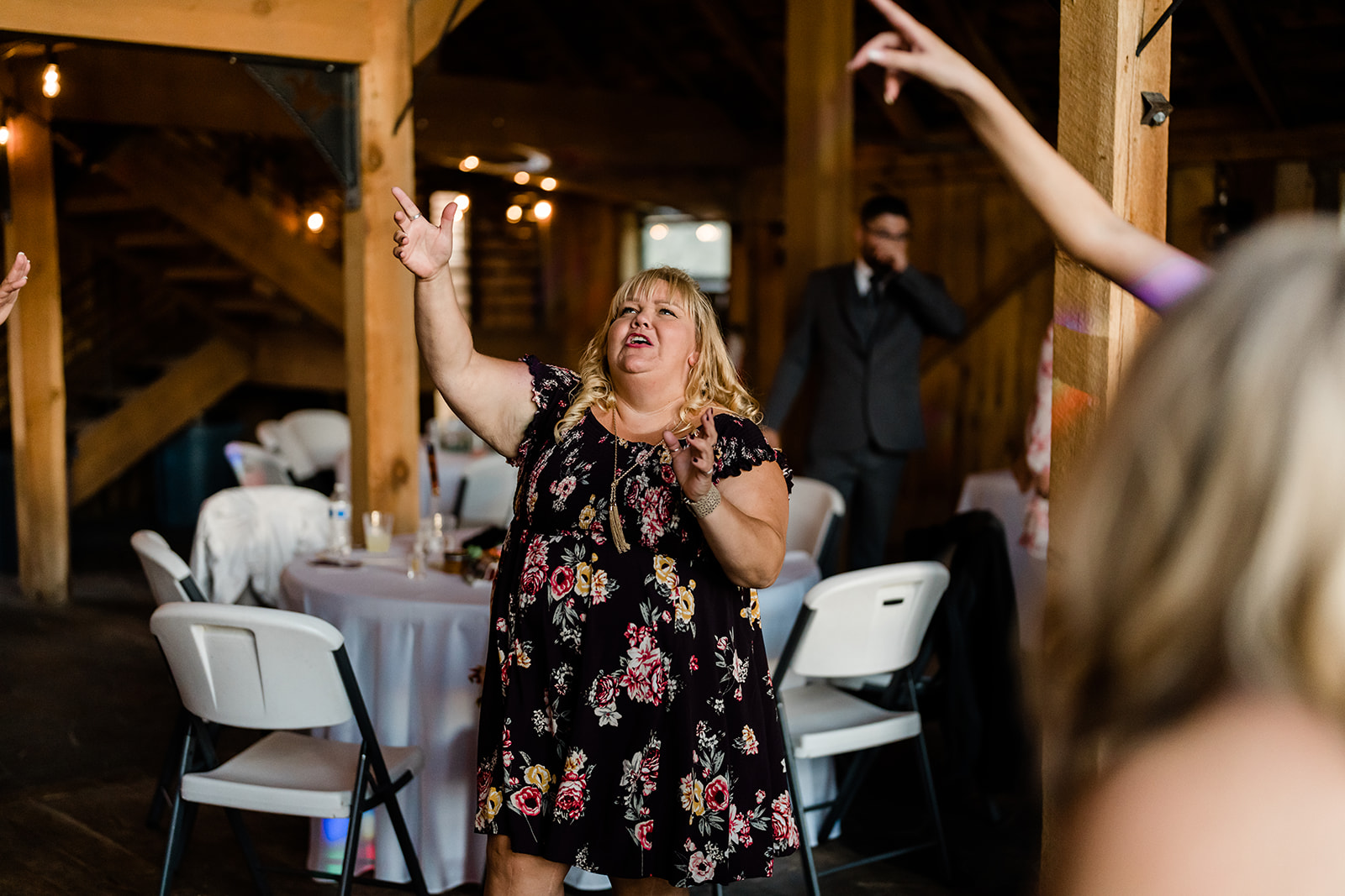 Woman dancing at a Cattle Barn Wedding