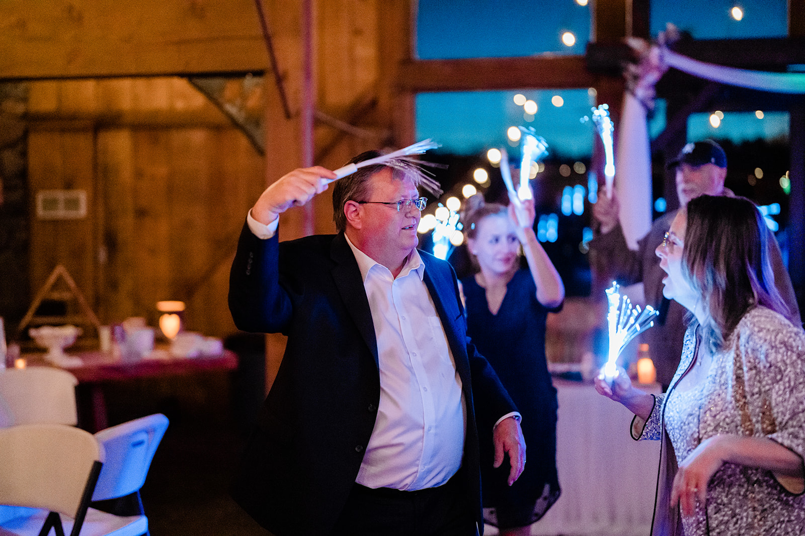 Priest dancing at a Cattle Barn Wedding