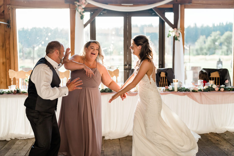 Bride and Groom dancing at a Cattle Barn Wedding
