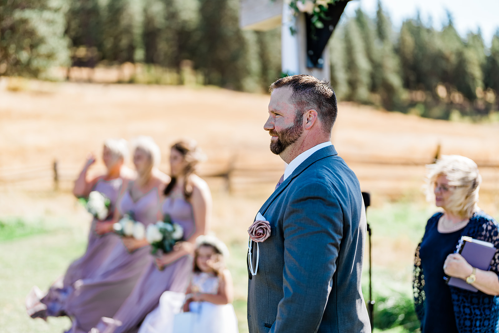 Groom at the altar of a Cattle Barn Wedding