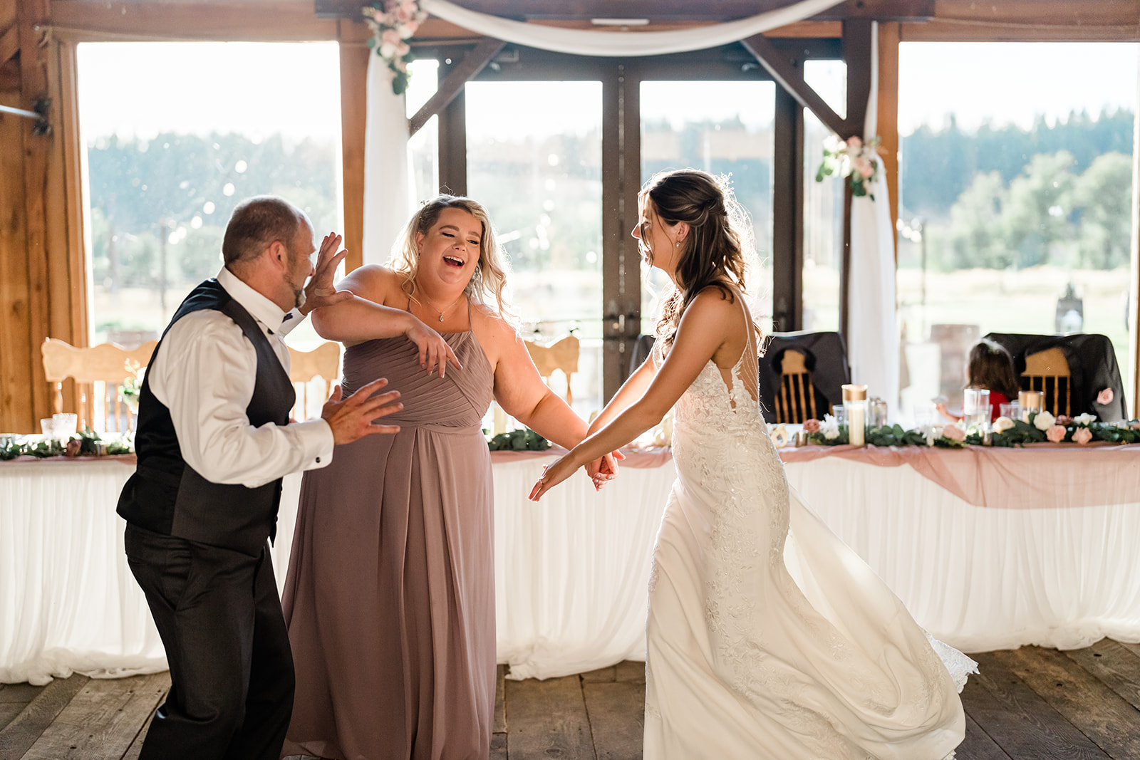 Couple dancing at a Cattle Barn Wedding