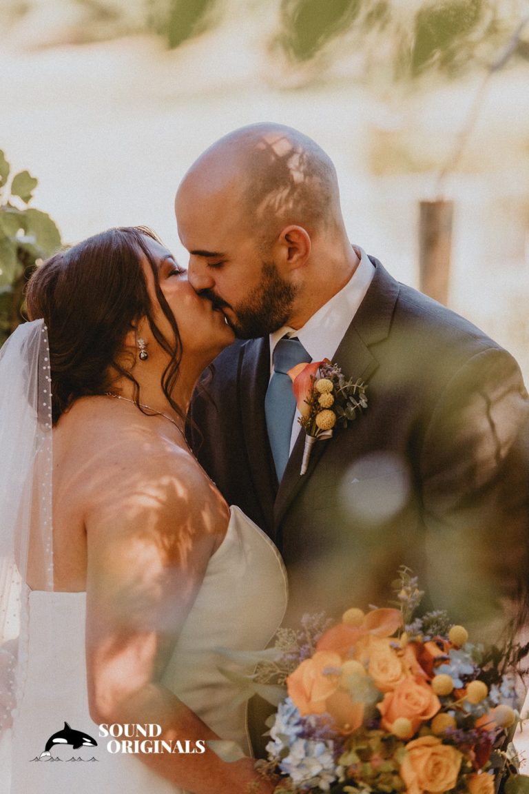 Couple sharing a kiss at the McMenamin's Edgefield Hotel