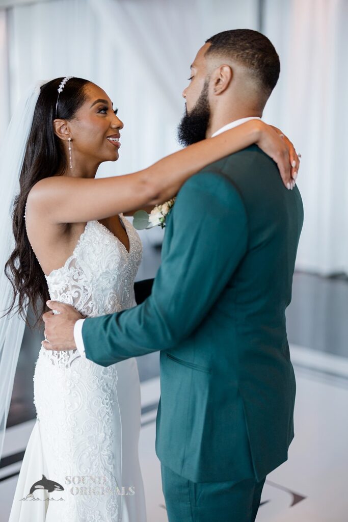 Bride happily stares at her man at Briza on the Bay Wedding