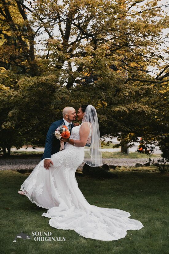 Joyful husband and wife at The Carey Gardens Wedding