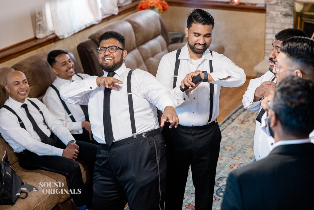 The groom enjoying special moments with his groomsmen near the Embassy Suites by Hilton Naperville Wedding