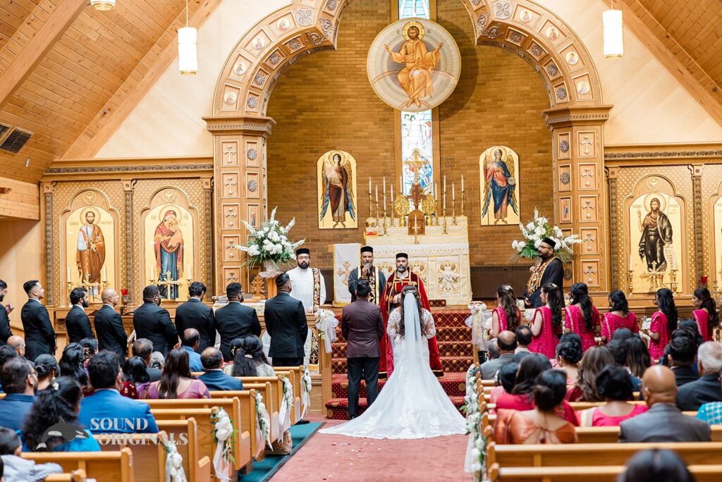 Bride and groom at the altar at their Embassy Suites by Hilton Naperville Wedding