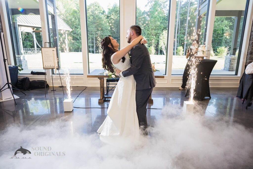 Husband and wife enjoy first dance at The Oakley on the Lake Wedding